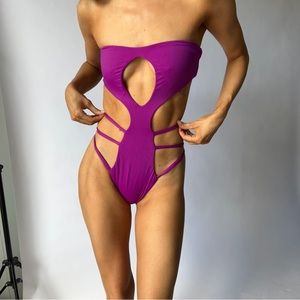 Strapless magenta cutout one-piece